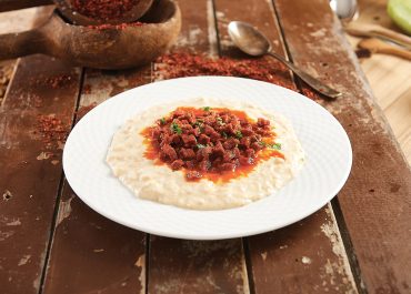 BEĞENDİ (sultan’s delight, lamb stew served on mashed eggplant) WITH PINAR TURKISH STYLE SAUSAGE